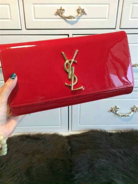 orange ysl clutch|Yves Saint Laurent Patent Leather Clutch .